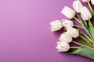 AI generated white letter and tulips on purple screen photo