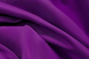 Purple fabric texture for background and design, beautiful pattern of silk or linen. photo