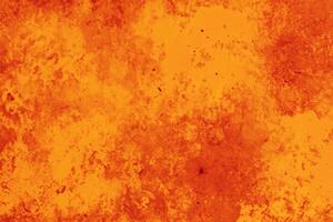 A grungy orange metal background and texture up close. photo
