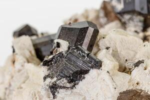 Macro tourmaline mineral stone on white background photo