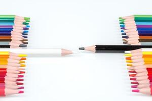 Multi-colored pencils in a row photo