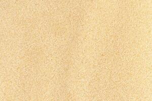 Brown Sand Texture Background from Desert Beach photo