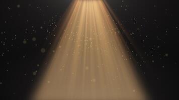 The spotlight illuminates the stage background. Spotlight with flying particles. Gold color rays. Empty scene with light for product.  4k video