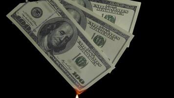 Slow motion of dollars money on fire lost money on Black Background. Financial disaster concept video