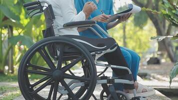 young asian physical therapist working with senior woman on walking with a walker video