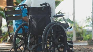 young asian physical therapist working with senior woman on walking with a walker video