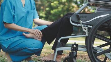 young asian physical therapist working with senior woman on walking with a walker video