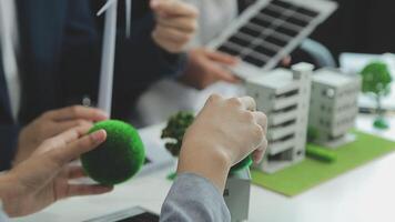 Group of business people planning and discussing on recycle reduce reuse policy symbol in office meeting room. Green business company with eco-friendly waste management regulation concept.Trailblazing video