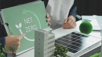 Group of business people planning and discussing on recycle reduce reuse policy symbol in office meeting room. Green business company with eco-friendly waste management regulation concept.Trailblazing video