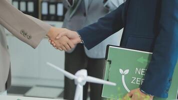 Group of business people planning and discussing on recycle reduce reuse policy symbol in office meeting room. Green business company with eco-friendly waste management regulation concept.Trailblazing video