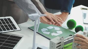 Group of business people planning and discussing on recycle reduce reuse policy symbol in office meeting room. Green business company with eco-friendly waste management regulation concept.Trailblazing video