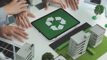 Group of business people planning and discussing on recycle reduce reuse policy symbol in office meeting room. Green business company with eco-friendly waste management regulation concept.Trailblazing video