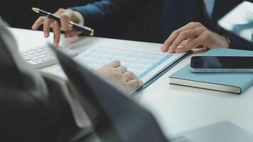 Business team collaboration discussing working analyzing with financial data and marketing growth report graph in team, presentation and brainstorming to strategy planning making profit of company. video