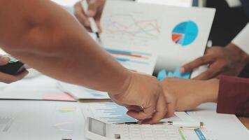 Business team collaboration discussing working analyzing with financial data and marketing growth report graph in team, presentation and brainstorming to strategy planning making profit of company. video