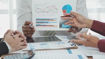 Business team collaboration discussing working analyzing with financial data and marketing growth report graph in team, presentation and brainstorming to strategy planning making profit of company. video
