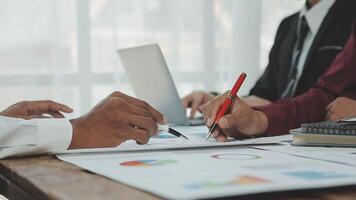 Business team collaboration discussing working analyzing with financial data and marketing growth report graph in team, presentation and brainstorming to strategy planning making profit of company. video