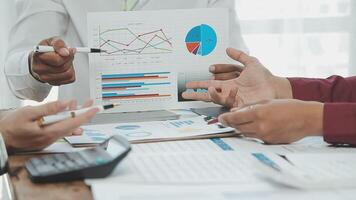 Business team collaboration discussing working analyzing with financial data and marketing growth report graph in team, presentation and brainstorming to strategy planning making profit of company. video