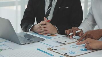 Business team collaboration discussing working analyzing with financial data and marketing growth report graph in team, presentation and brainstorming to strategy planning making profit of company. video
