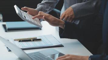Business team collaboration discussing working analyzing with financial data and marketing growth report graph in team, presentation and brainstorming to strategy planning making profit of company. video