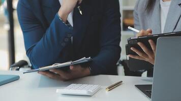 Business team collaboration discussing working analyzing with financial data and marketing growth report graph in team, presentation and brainstorming to strategy planning making profit of company. video
