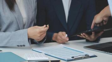 Business team collaboration discussing working analyzing with financial data and marketing growth report graph in team, presentation and brainstorming to strategy planning making profit of company. video