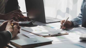 Business team collaboration discussing working analyzing with financial data and marketing growth report graph in team, presentation and brainstorming to strategy planning making profit of company. video
