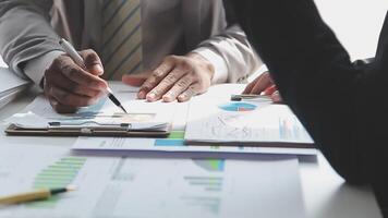 Business team collaboration discussing working analyzing with financial data and marketing growth report graph in team, presentation and brainstorming to strategy planning making profit of company. video