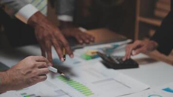 Business team collaboration discussing working analyzing with financial data and marketing growth report graph in team, presentation and brainstorming to strategy planning making profit of company. video