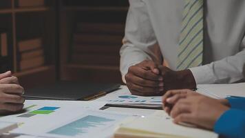 Business team collaboration discussing working analyzing with financial data and marketing growth report graph in team, presentation and brainstorming to strategy planning making profit of company. video