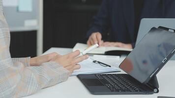 Business team collaboration discussing working analyzing with financial data and marketing growth report graph in team, presentation and brainstorming to strategy planning making profit of company. video