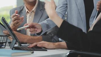 Business team collaboration discussing working analyzing with financial data and marketing growth report graph in team, presentation and brainstorming to strategy planning making profit of company. video