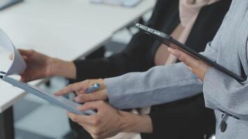 Business team collaboration discussing working analyzing with financial data and marketing growth report graph in team, presentation and brainstorming to strategy planning making profit of company. video