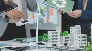 Group of business people planning and discussing on recycle reduce reuse policy symbol in office meeting room. Green business company with eco-friendly waste management regulation concept.Trailblazing video