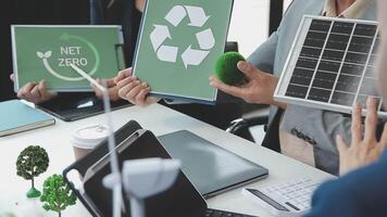 Group of business people planning and discussing on recycle reduce reuse policy symbol in office meeting room. Green business company with eco-friendly waste management regulation concept.Trailblazing video