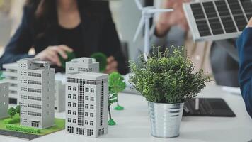 Group of business people planning and discussing on recycle reduce reuse policy symbol in office meeting room. Green business company with eco-friendly waste management regulation concept.Trailblazing video