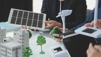 Group of business people planning and discussing on recycle reduce reuse policy symbol in office meeting room. Green business company with eco-friendly waste management regulation concept.Trailblazing video