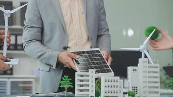 Group of business people planning and discussing on recycle reduce reuse policy symbol in office meeting room. Green business company with eco-friendly waste management regulation concept.Trailblazing video