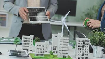 Group of business people planning and discussing on recycle reduce reuse policy symbol in office meeting room. Green business company with eco-friendly waste management regulation concept.Trailblazing video