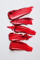 AI generated Vivid Red Paint Strokes on a Pristine White Background photo