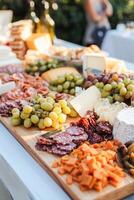 AI generated Gourmet Cheese and Charcuterie Board Featuring Diverse Selection for Elegant Entertaining photo