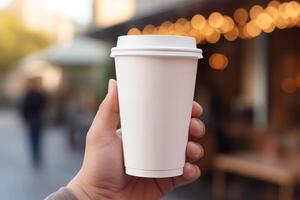 AI generated Close up of hand holding coffee cup on blurred bokeh outdoor background photo