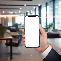 AI generated Businessman hand holding a smartphone with blank screen for mockup with office background photo