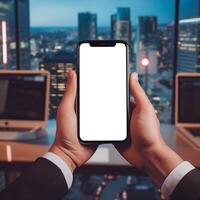 AI generated Hands holding a smartphone with blank screen in office with blurred cityscape background photo