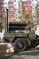 Army kitchen. Cooking for the military in the field. Food for soldiers. Cooking in an open area. photo