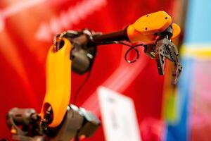 Robotic arm of a robotic arm at the exhibition stand to demonstrate technology. photo