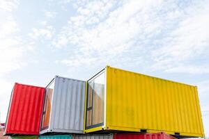 Sea containers, colored bright box, metal box of large sizes, box against the sky, design of a new project, a cafe on the roof. photo