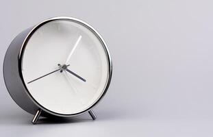 Alarm clock. High quality studio photography, time concept and working with time. photo