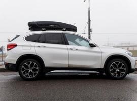 Minsk, Belarus, March 4, 2024 - BMW car with roof rack photo