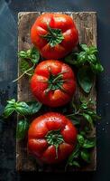 AI generated Three ripe tomatoes with basil leaves on wooden board photo