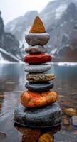 AI generated Stack of colorful zen stones. A stack of pebbles in front of a lake photo